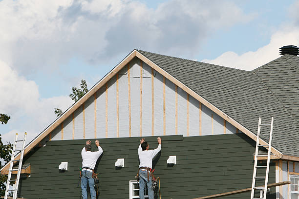 Professional Siding Installation technician working in Victoria, MN